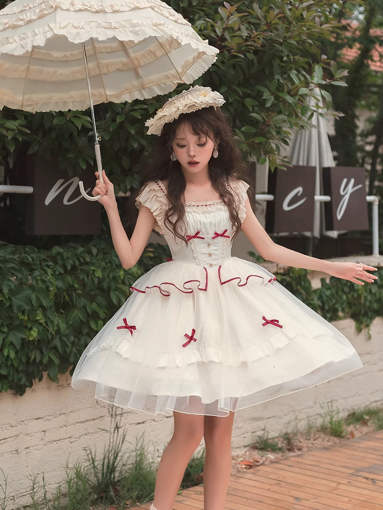 White dress with outlet red bow